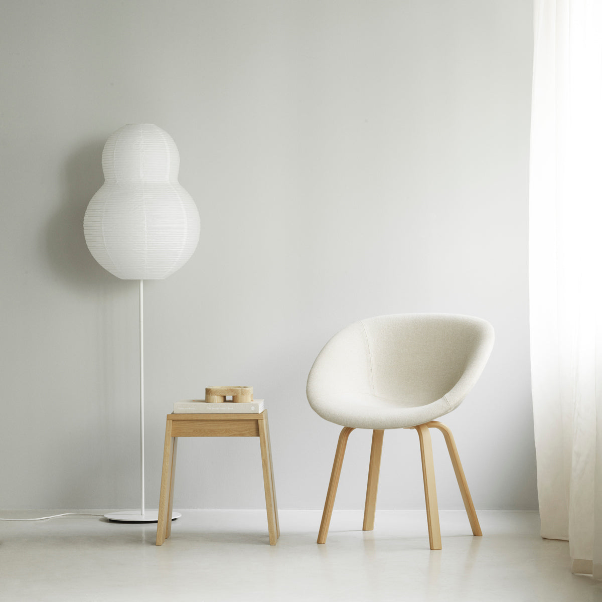 Mat Armchair by Normann Copenhagen , showing mat armchair in live shot.