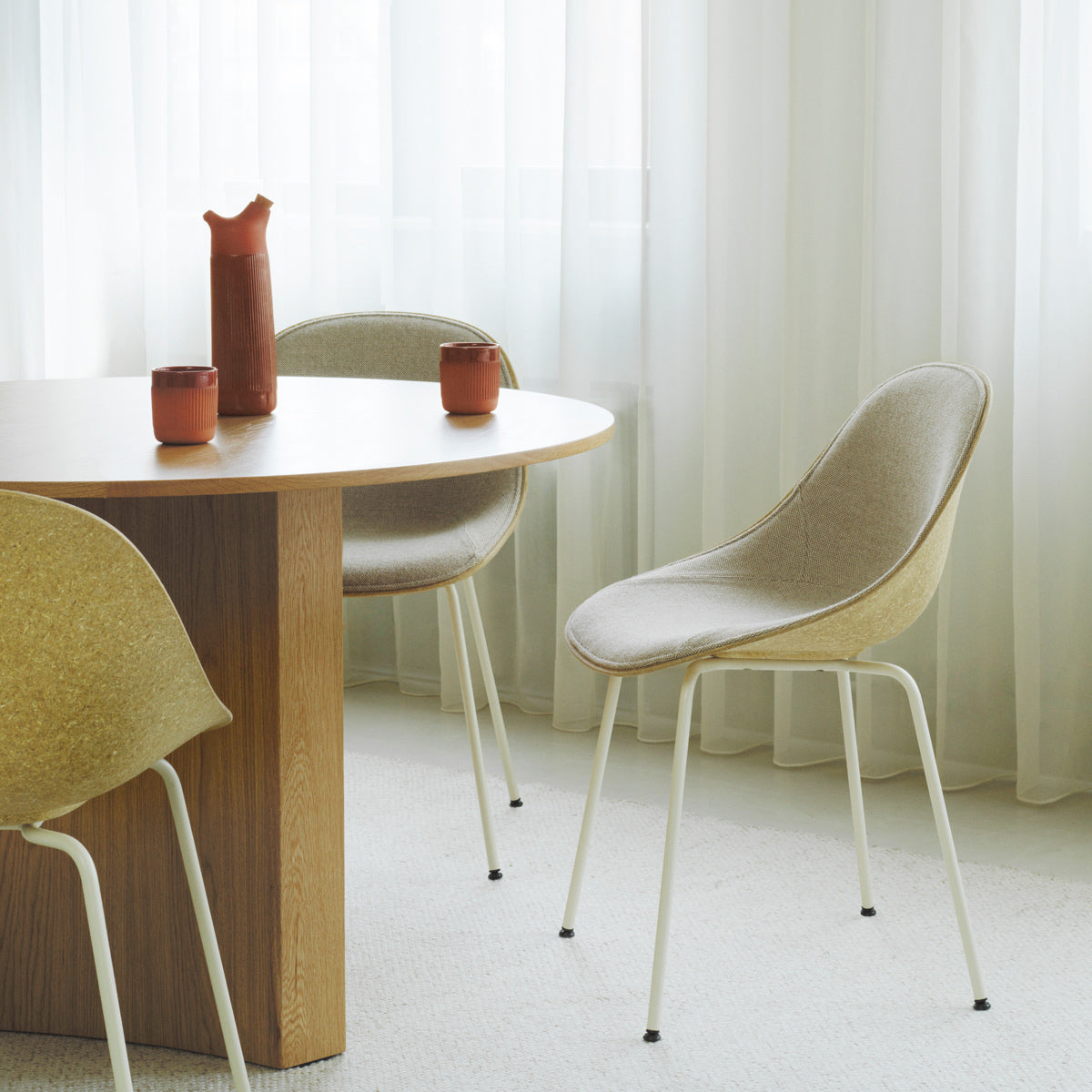 Mat Chair by Normann Copenhagen, showing mat chairs in live shot.