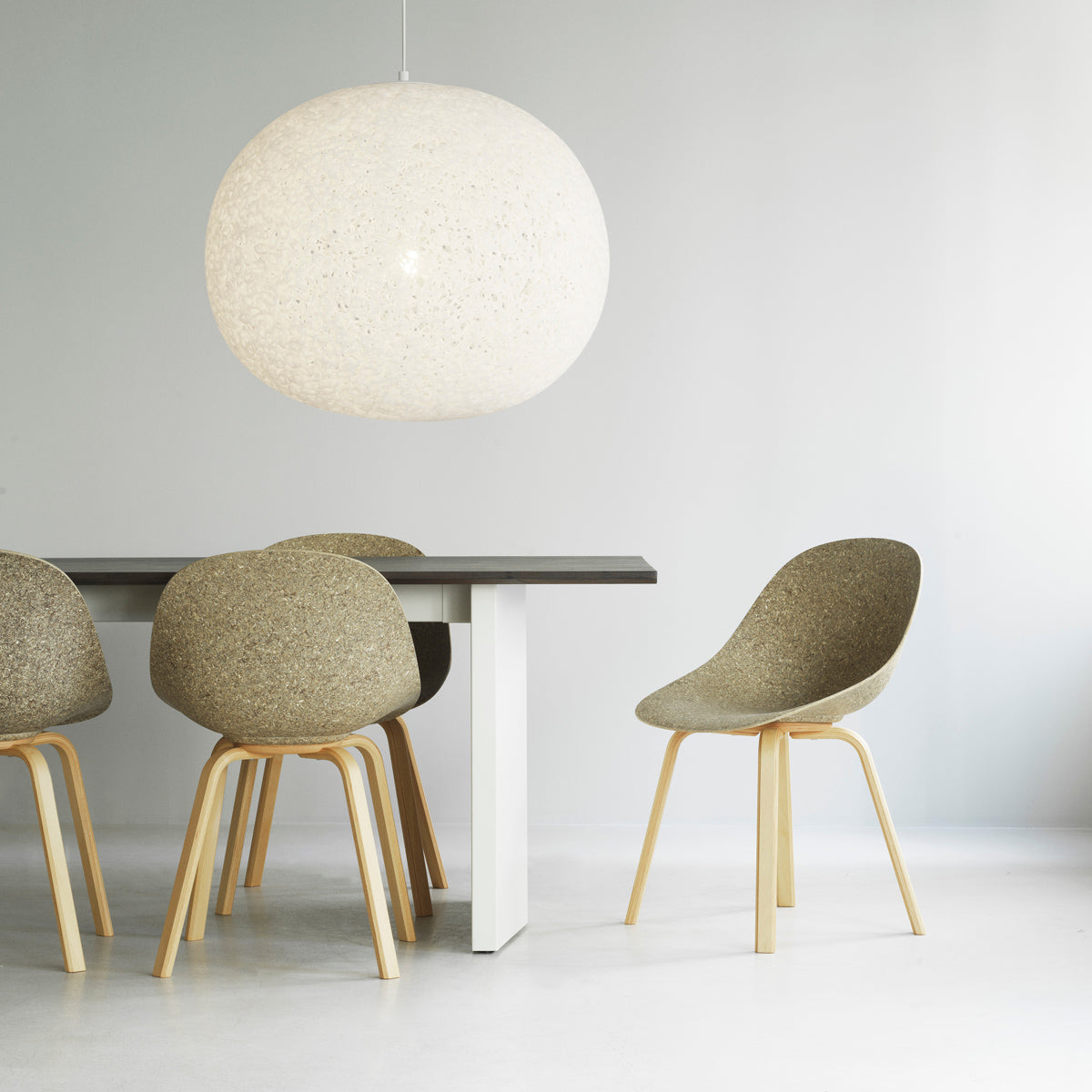 Mat Chair by Normann Copenhagen, showing mat chairs in live shot.