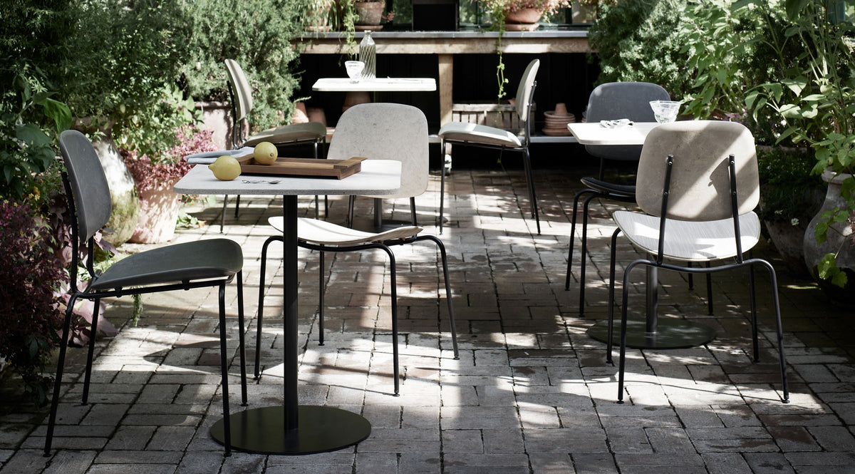 Mater Cafe Table by Mater, showing mater cafe tables in live shot.