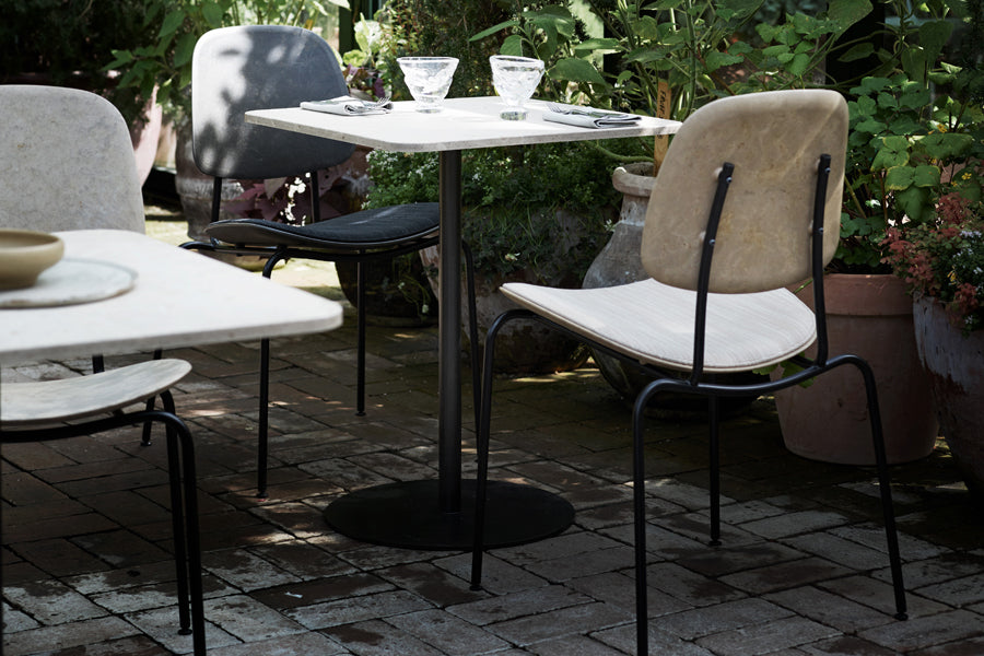 Mater Cafe Table by Mater, showing mater cafe tables in live shot.