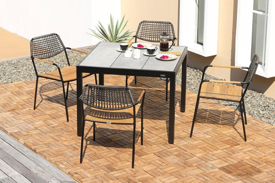 Meika Wicker Stacking Chair by Mamagreen, showing meika wicker stacking chairs in live shot.