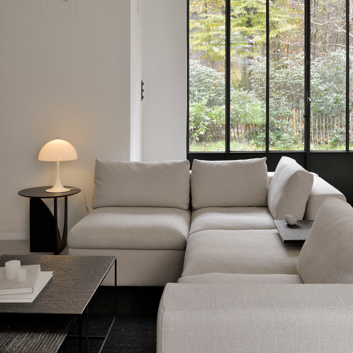 Mellow Sofa by Ethnicraft, showing mellow sofa in live shot.