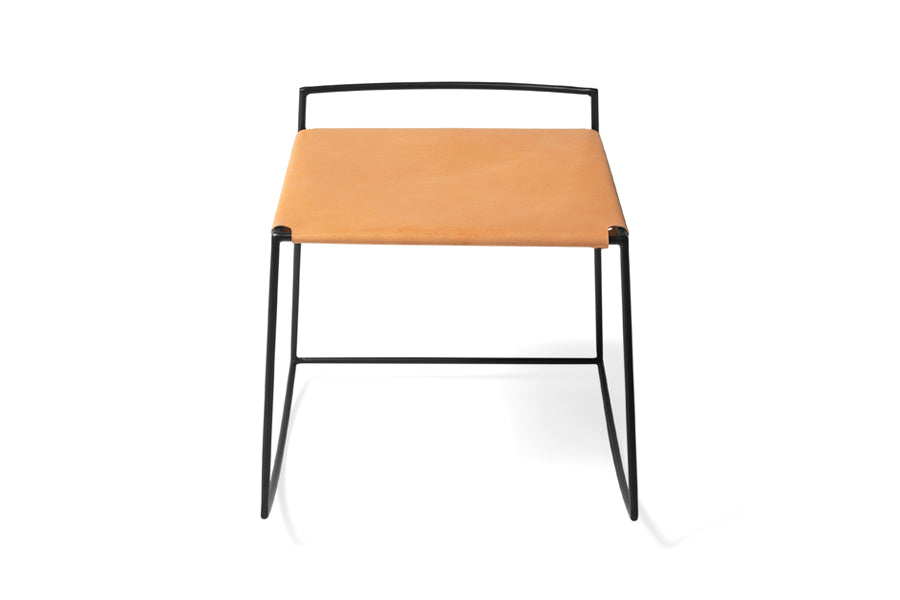 Mia Rocking Stool by Tronk Design, showing front view of mia rocking stool in black powder coated steel/natural leather.