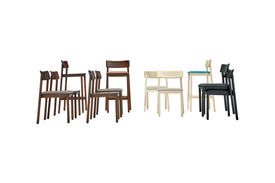Mika Chair by B&T, showing different angle view of mika chairs in natural/black/walnut woods.