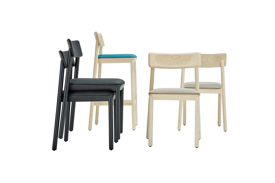Mika Chair by B&T, showing different angle view of mika chairs in natural/black woods.