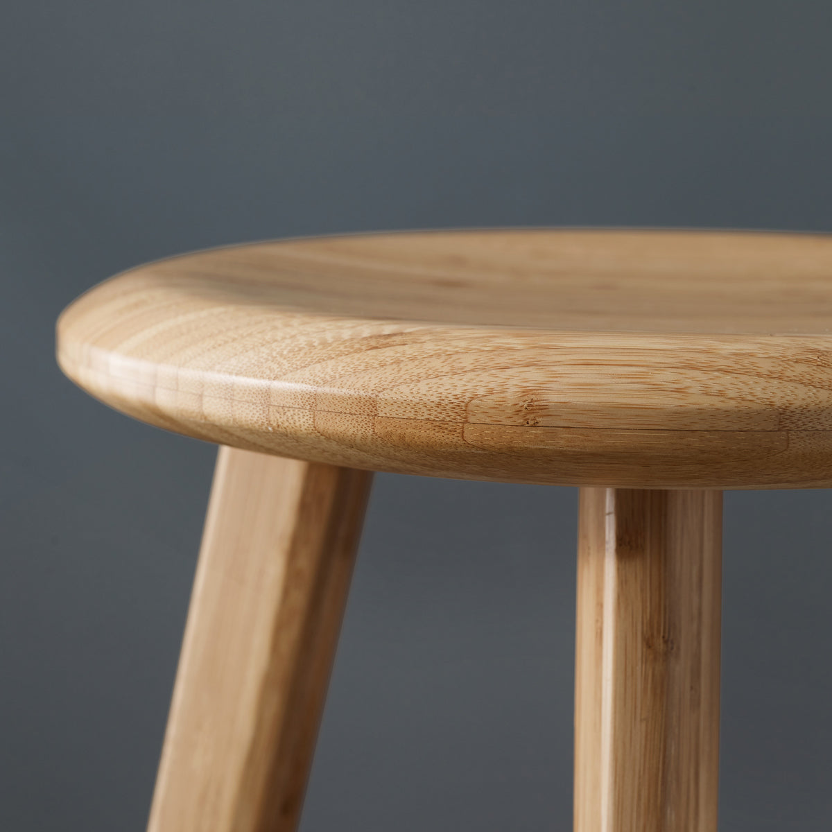 Mimosa Bar Stool by Greenington, showing closeup view of mimosa bar stool in live shot.
