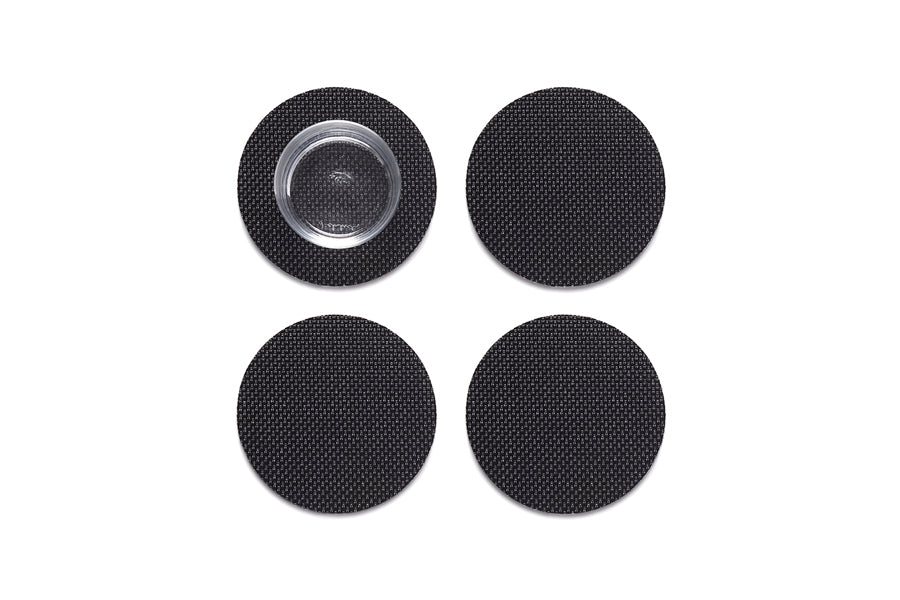 Mini Basketweave Round Coasters Set of 4 by Chilewich, showing top view of mini basketweave round coasters set of 4 in black mini weave.