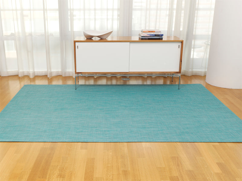 Mini Basketweave Round Large Rug by Chilewich, showing mini basketweave round large rug in live shot.