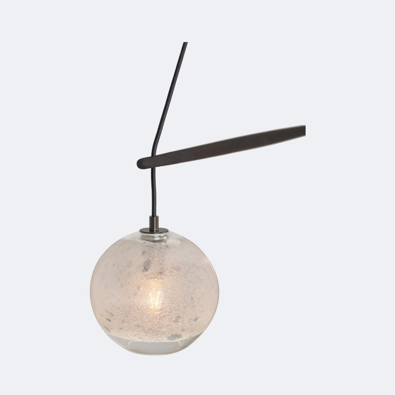 Miro Linear Pendant by Cerno, showing closeup view of miro linear chandelier/pendant in live shot.