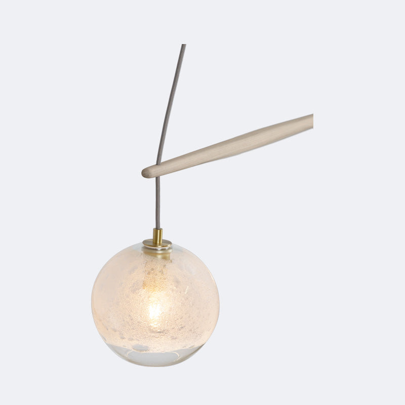 Miro Linear Pendant by Cerno, showing closeup view of miro linear chandelier/pendant in live shot.