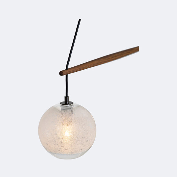 Miro Linear Pendant by Cerno, showing closeup view of miro linear chandelier/pendant in live shot.