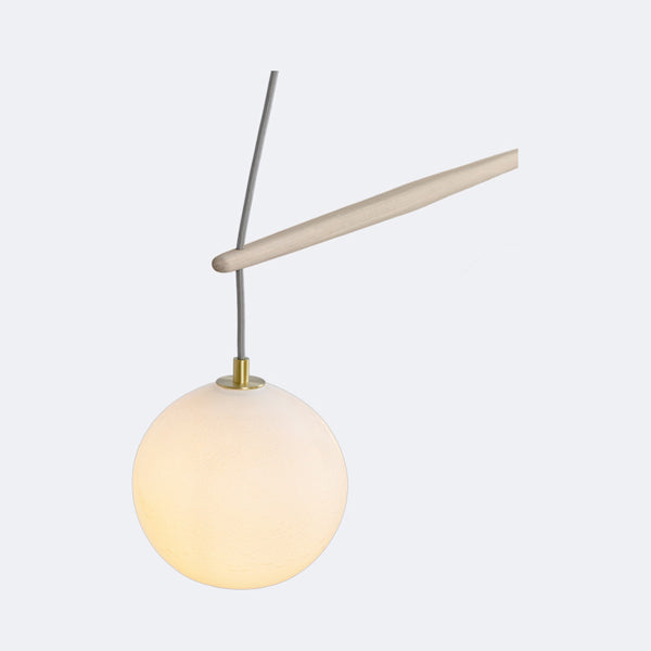 Miro Linear Pendant by Cerno, showing closeup view of miro linear chandelier/pendant in live shot.