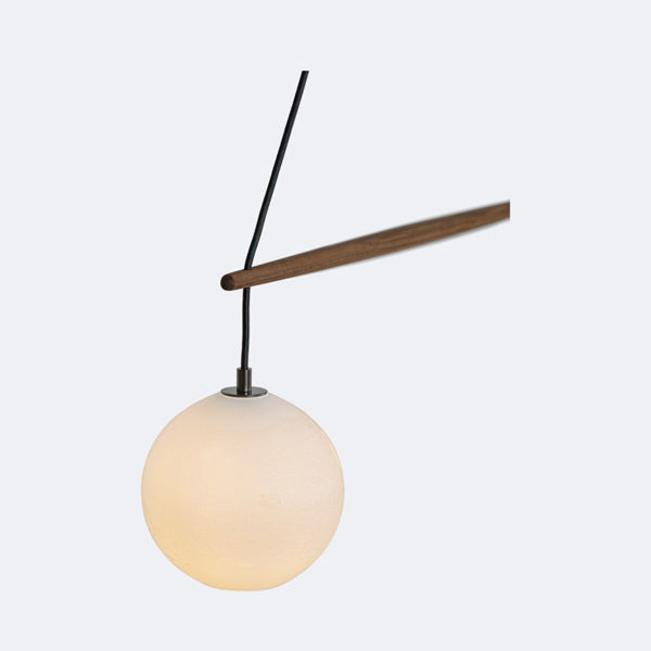 Miro Linear Pendant by Cerno, showing closeup view of miro linear chandelier/pendant in live shot.