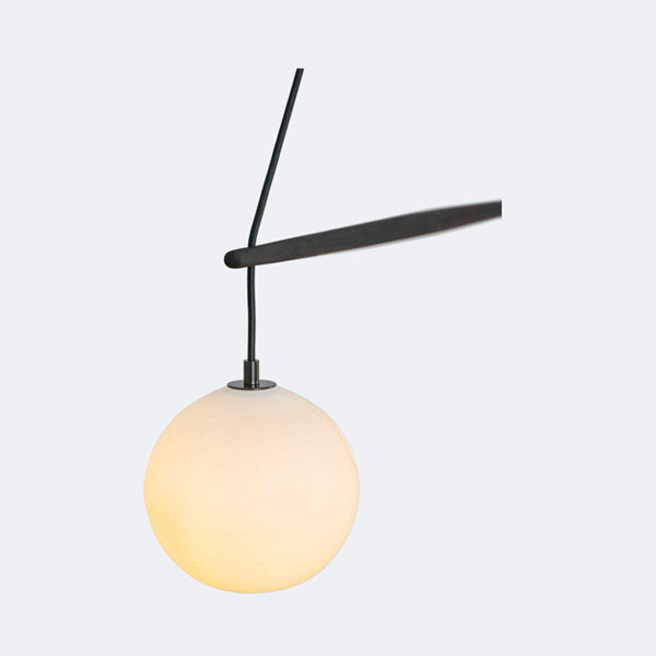 Miro Linear Pendant by Cerno, showing closeup view of miro linear chandelier/pendant in live shot.
