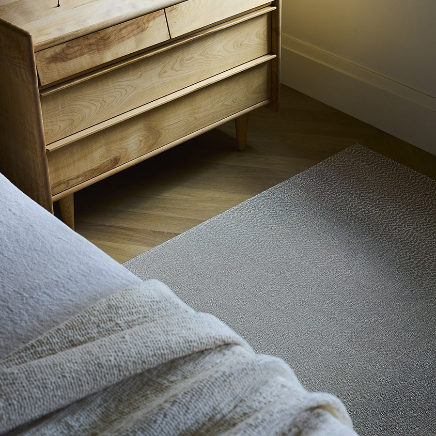 Moire Woven Floor Mat by Chilewich, showing closeup view of moire woven floor mat in live shot.