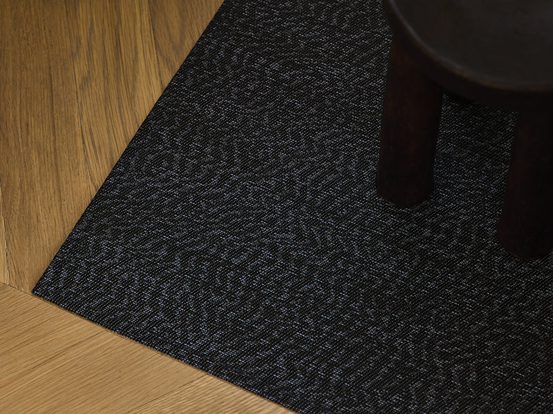 Moire Woven Floor Mat by Chilewich, showing closeup view of moire woven floor mat in live shot.