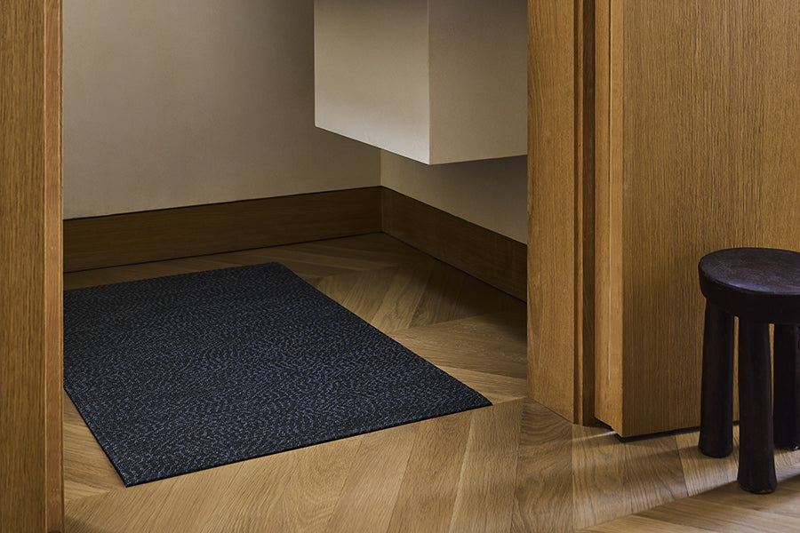Moire Woven Floor Mat by Chilewich, showing moire woven floor mat in live shot.