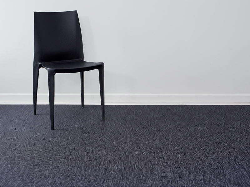 Moire Woven Floor Mat by Chilewich, showing closeup view of moire woven floor mat in live shot.