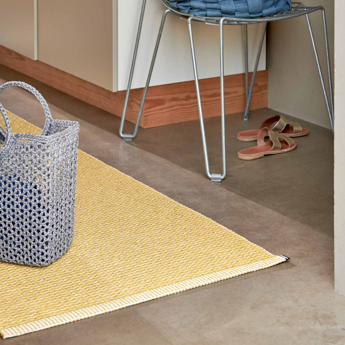MONO Pale Yellow Rug by Pappelina, showing mono pale yellow rug in live shot.