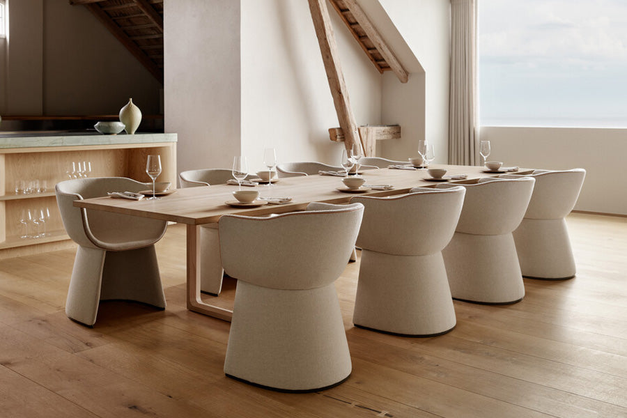 Monolit Dining Chair by Fritz Hansen, showing monolit dining chair in live shot.