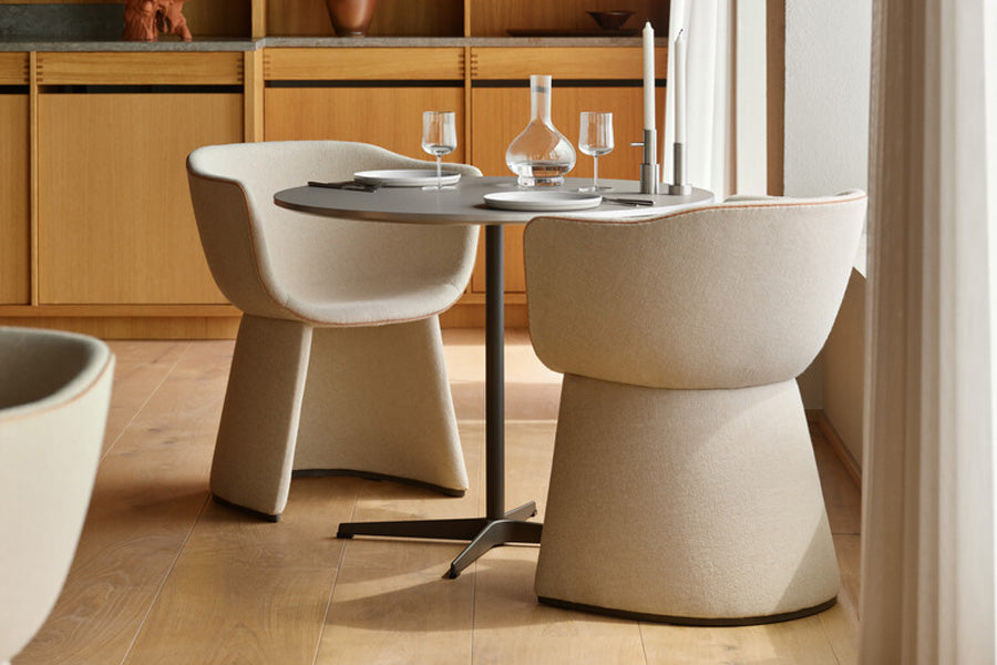 Monolit Dining Chair by Fritz Hansen, showing monolit dining chair in live shot.