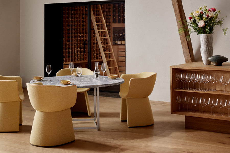 Monolit Dining Chair by Fritz Hansen, showing monolit dining chair in live shot.