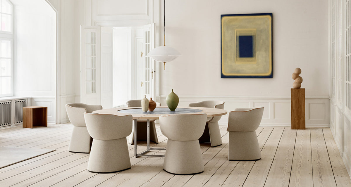 Monolit Dining Chair by Fritz Hansen, showing monolit dining chair in live shot.