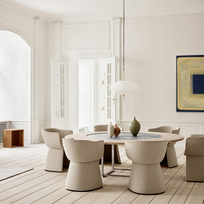 Monolit Dining Chair by Fritz Hansen, showing monolit dining chair in live shot.