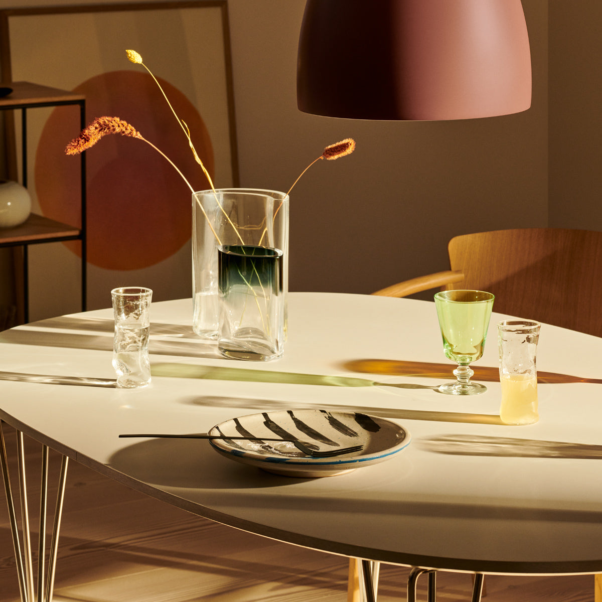 Moon Eye Vase by Fritz Hansen, showing moon eye vase in live shot.