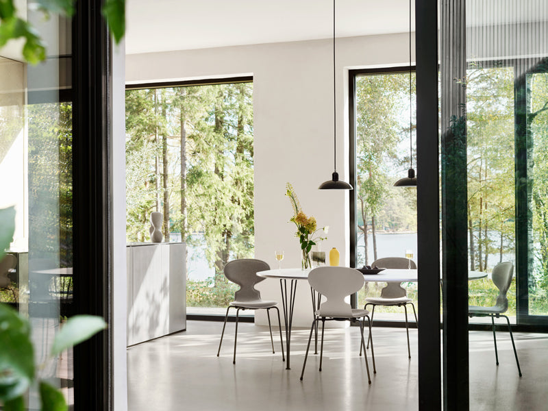 Moon Eye Vase by Fritz Hansen, showing moon eye vase in live shot.