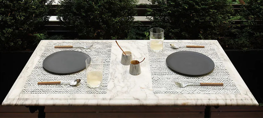 Mosaic Tabletop by Chilewich, showing mosaic tabletops in live shot.