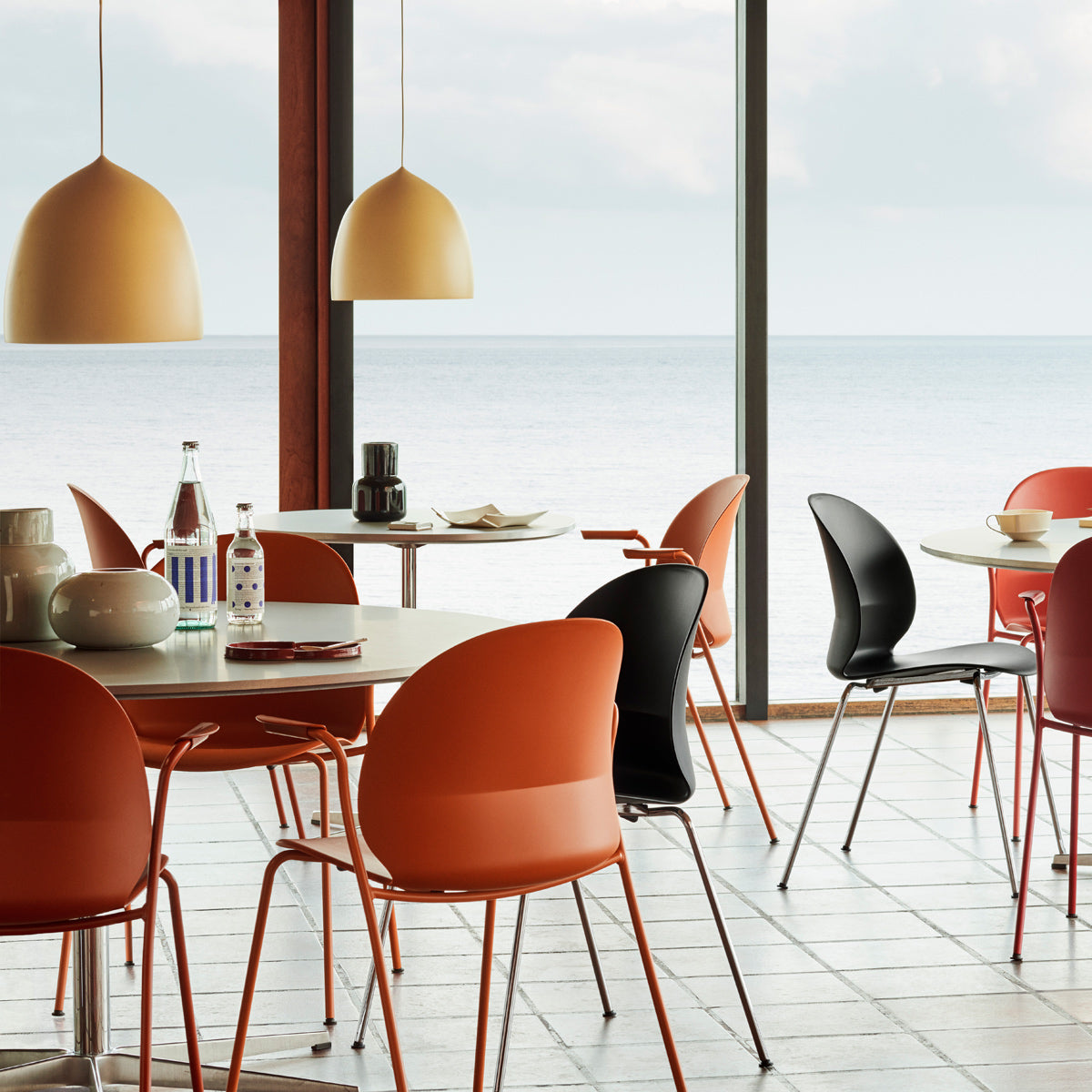 N02 Recycle Armchair by Fritz Hansen, showing n02 recycle armchairs in live shot.