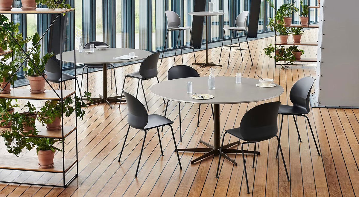 N02 Recycle Chair by Fritz Hansen, showing n02 recycle chairs in live shot.