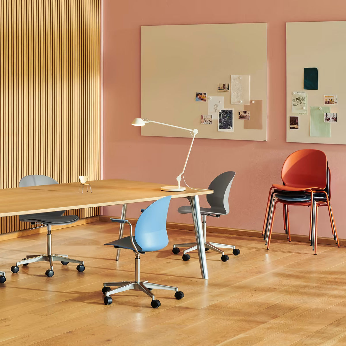 N02 Recycle Chair by Fritz Hansen, showing n02 recycle chairs in live shot.