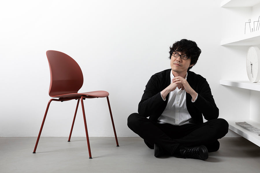 N02 Recycle Chair by Fritz Hansen, showing n02 recycle chair in live shot.