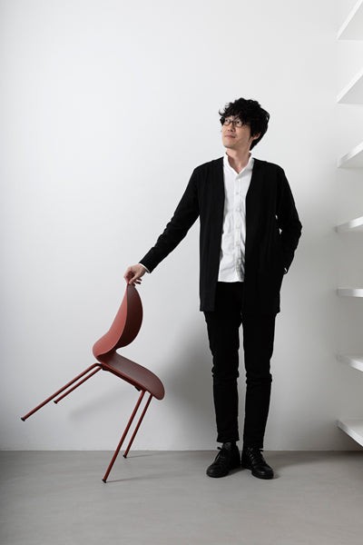 N02 Recycle Chair by Fritz Hansen, showing n02 recycle chair in live shot.