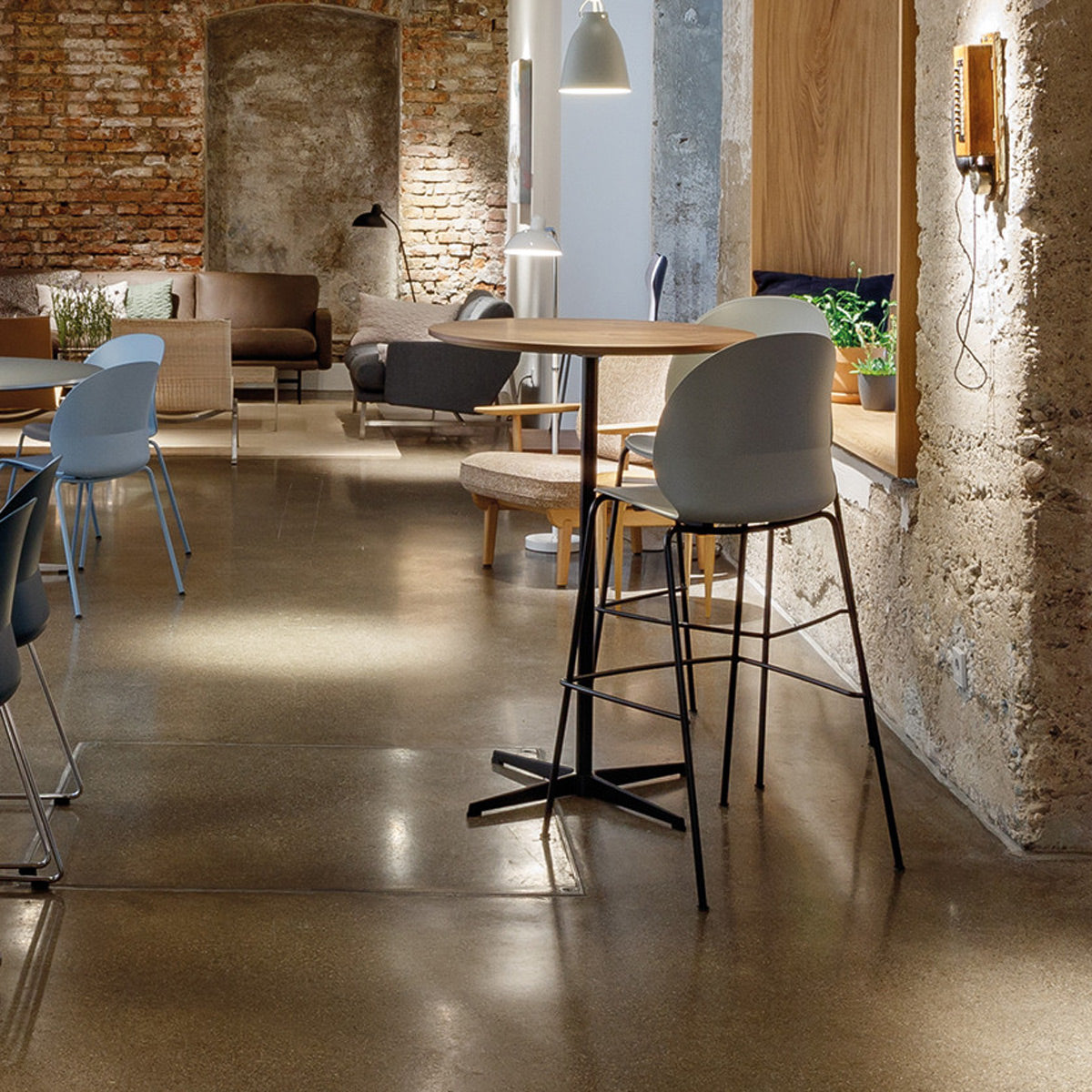N02 Recycle Counter Stool by Fritz Hansen, showing n02 recycle counter stools in live shot.