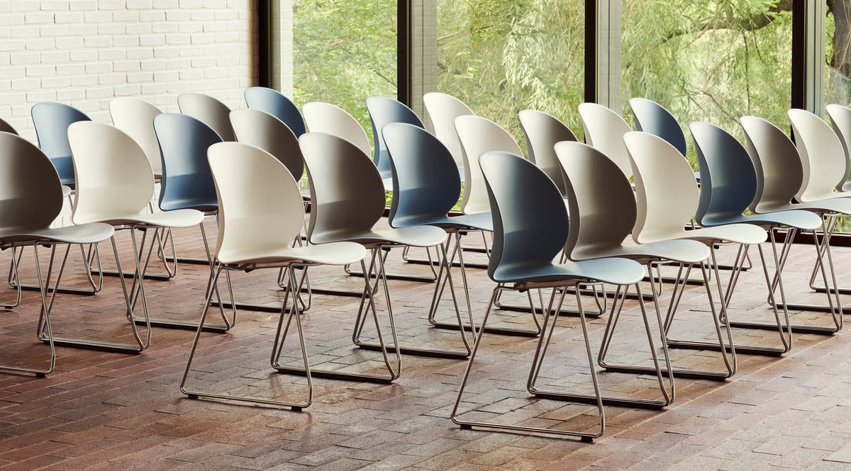 N02 Recycle Sledge Chair by Fritz Hansen , showing n02 recycle sledge chairs in live shot.