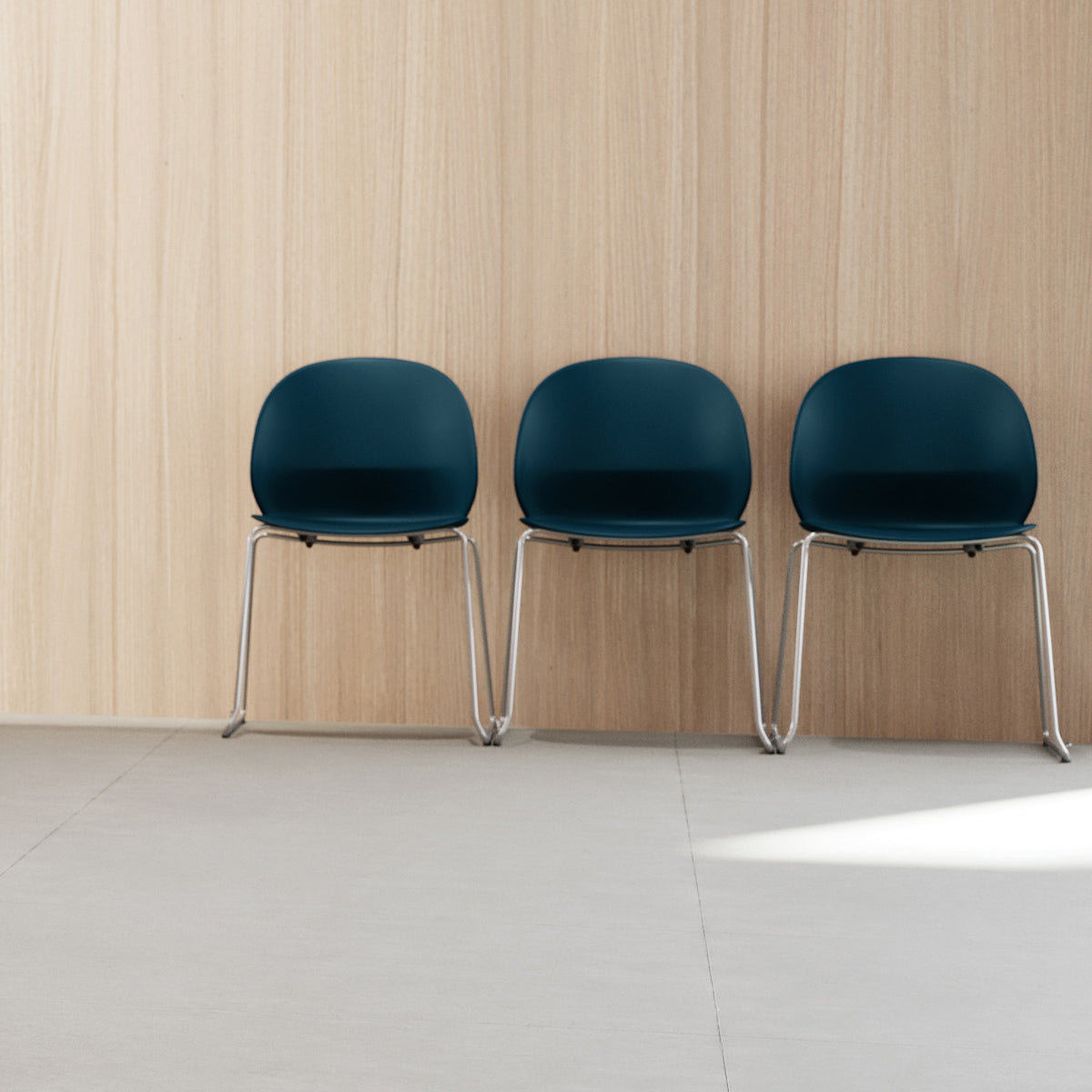 N02 Recycle Sledge Welded Chair by Fritz Hansen, showing n02 recycle sledge welded chairs in live shot.