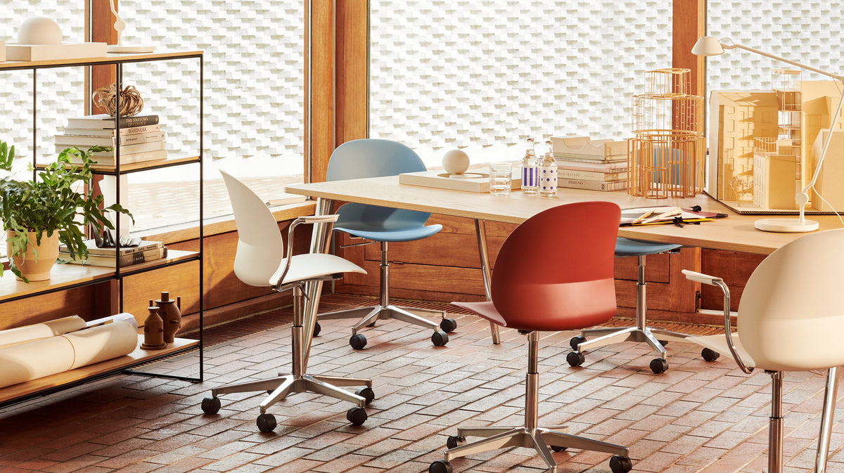 N02 Recycle Swivel Armchair by Fritz Hansen, showing n02 recycle swivel armchairs in live shot.