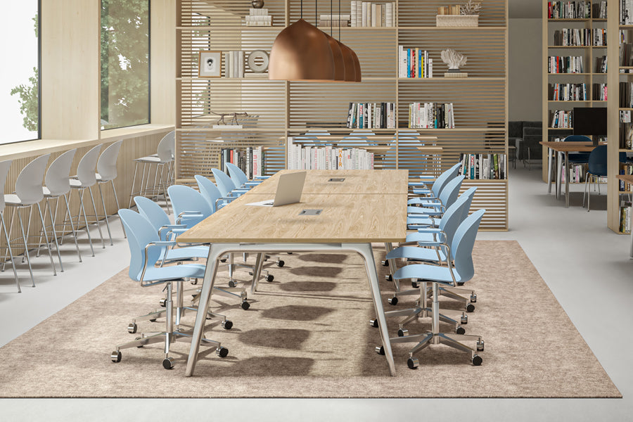 N02 Recycle Swivel Armchair by Fritz Hansen, showing n02 recycle swivel armchairs in live shot.