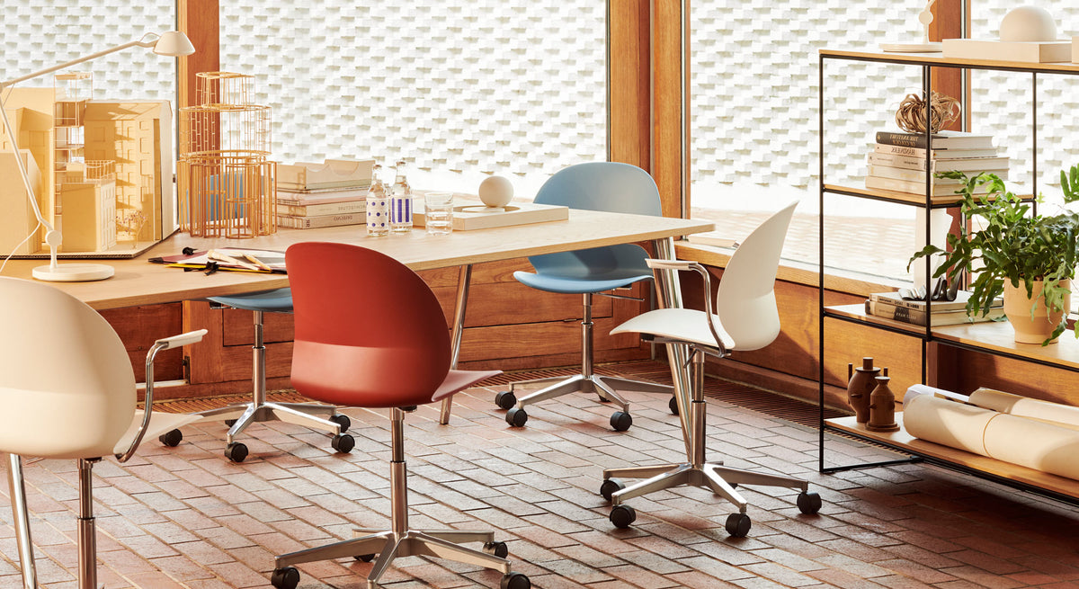 N02 Recycle Swivel Chair by Fritz Hansen, showing n02 recycle swivel chairs in live shot.