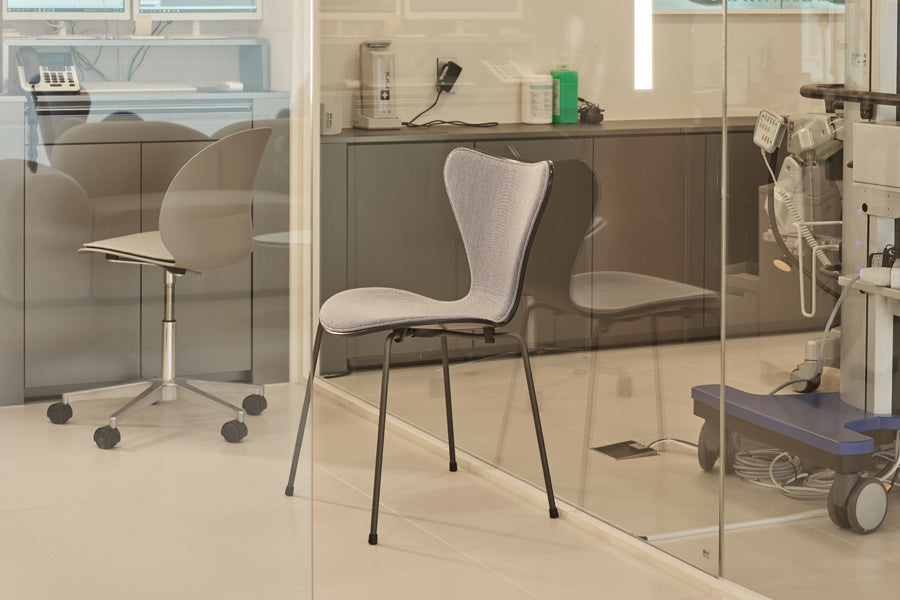 N02 Recycle Swivel Chair by Fritz Hansen, showing n02 recycle swivel chair in live shot.
