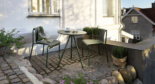 Nami Outdoor Cafe Table by Houe, showing nami outdoor cafe table in live shot.