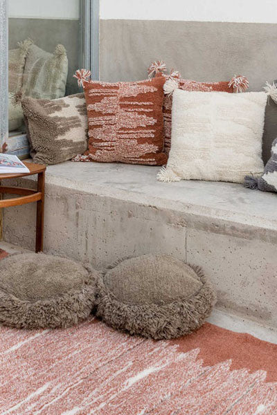 Nomade Jam Cushion by Lorena Canals, showing nomade jam cushion in live shot.