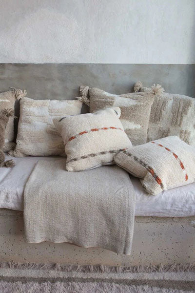 Nomade Jam Cushion by Lorena Canals, showing nomade jam cushion in live shot.