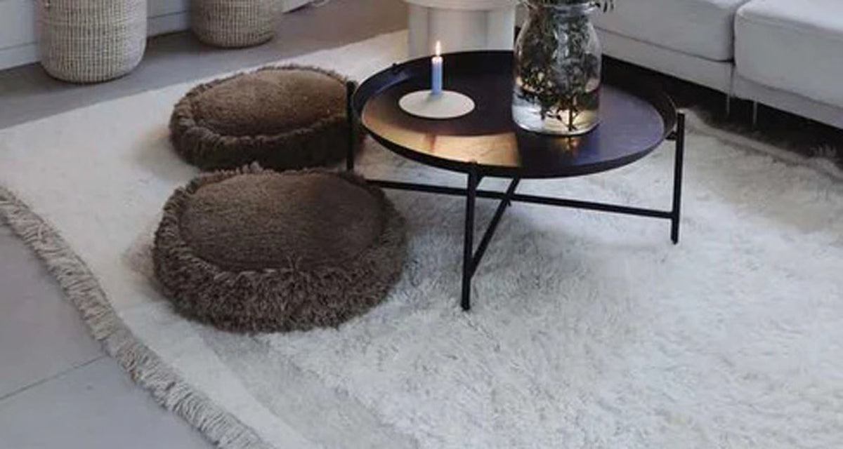 Nomade Jam Cushion by Lorena Canals, showing nomade jam cushion in live shot.