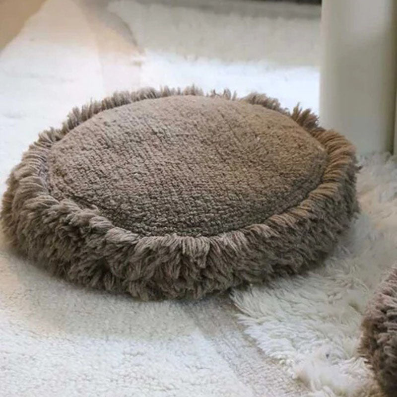 Nomade Jam Cushion by Lorena Canals, showing nomade jam cushion in live shot.