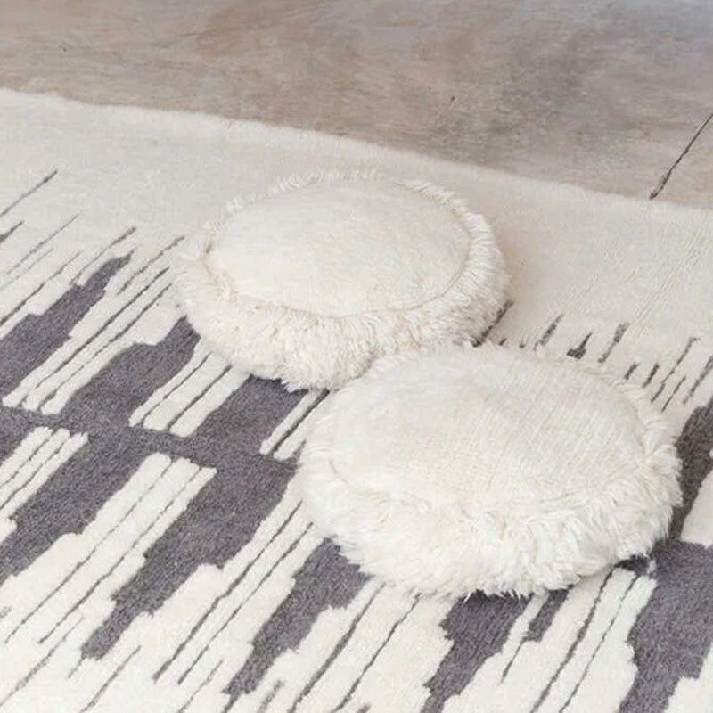 Nomade Jam Cushion by Lorena Canals, showing nomade jam cushion in live shot.
